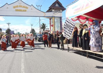 30 Regu Organisasi Wanita dan Majelis Taklim Ikut Lomba Gerak Jalan Syar’i di Bone Bolango