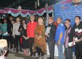 Plt Bupati Merlan S. Uloli saat foto bersama pada perayaan natal tahun 2023