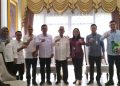 Dukung Program BPJS Ketenagakerjaan, Bupati Ismet Mile Tegaskan Seluruh Pekerja Ekosistem Desa Wajib Terlindungi
