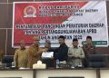 Bupati Bone Bolango, Ismet Mile didampingi Wabup Risman Tolingguhu pada Rapat Paripurna DPRD Kabupaten Bone Bolango dalam rangka Penyampaian Rancangan Peraturan Daerah tentang Pertanggungjawaban APBD Tahun Anggaran 2025 di Ruang Sidang Paripurna DPRD Bone Bolango, Selasa (23/6/2026). (F.Indra/Diskominfo)