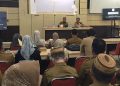 Sekretaris Daerah Bone Bolango, Iwan Mustapa saat memberikan sambutan pada Pembukaan Bimtek dan Workshop Penyusunan Inovasi Daerah di Aula Tolopani Bappeda Litbang Bone Bolango, Selasa (7/7/2026). (F.Indra/Diskominfo)