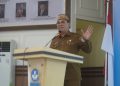 Sekretaris Daerah Bone Bolango, Iwan Mustapa saat menghadiri kegiatan ASN Peduli Pekerja Kabupaten Bone Bolango yang dirangkaikan dengan Sosialisasi Persiapan SPMB SNT 2026 dan Lokal Transit SNT 6 Bone Bolango di Aula BPMP Provinsi Gorontalo, Selasa (21/7/2026). (F.Onal/Prokopim)