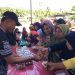 Ratusan warga memadati lokasi Pasar Murah Bersubsidi yang digelar di Lapangan Duano, Kecamatan Suwawa Tengah, Selasa (14/7/2026). (F.Indra/Diskominfo