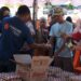 Sebanyak 1.000 paket bahan kebutuhan pokok bersubsidi disalurkan kepada masyarakat pada Pasar Murah Bersubsidi yang digelar di Lapangan Taruna Jaya, Desa Bilungala, Kecamatan Bonepantai, Jumat (31/7/2026). (F.Fauzi/Diskominfo)