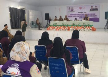 Bupati Ismet Mile saat membuka Bimbingan Teknis (Bimtek) Peningkatan Kapasitas bagi Pengurus Posyandu 6 Bidang Standar Pelayanan Minimal (SPM) Desa Tingkat Kabupaten Bone Bolango Tahun 2026 di BPU Kabila, Senin (24/8/2026). (F.Indra/Diskominfo)