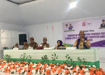 Ketua Tim Pembina Posyandu Bone Bolango, Ruwaida Ismet Mile saat menghadiri Bimbingan Teknis Peningkatan Kapasitas bagi Pengurus Posyandu 6 Bidang SPM di Desa tingkat Kabupaten Bone Bolango tahun 2026 di BPU Kabila, Senin (24/8/2026). (F.Indra/Diskominfo)
