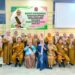 Bunda PAUD Bone Bolango, Ruwaida Ismet Mile saat foto bersama usai Rapat Koordinasi Pembahasan Rencana Tindaklanjut Program/Kegiatan PAUD Kabupaten Bone Bolango Tahun 2026 di Aula Bappeda Litbang Bone Bolango, Senin (31/8/2026). (F.Indra/Diskominfo)
