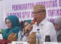 Bupati Ismet Mile saat menghadiri Pelantikan Ketua Tim Penggerak PKK Kecamatan Tapa yang dirangkaikan dengan Bimtek Peningkatan Kapasitas Tim Pengurus Posyandu 6 Bidang Standar Pelayanan Minimal (SPM) di Desa Wilayah Tapa Bulango, di Aula PKBM Desa Kramat, Kecamatan Tapa, Rabu (16/9/2026). (F.Onal/Prokopim)