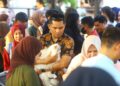 Vaksinasi Rabies dan Pemeriksaan Kesehatan Gratis dalam rangka Hari Karantina ke-149 yang digelar di Kawasan Danau Perintis, Bone Bolango, Jumat (2/10/2026). (F.Yudi/Prokopim)